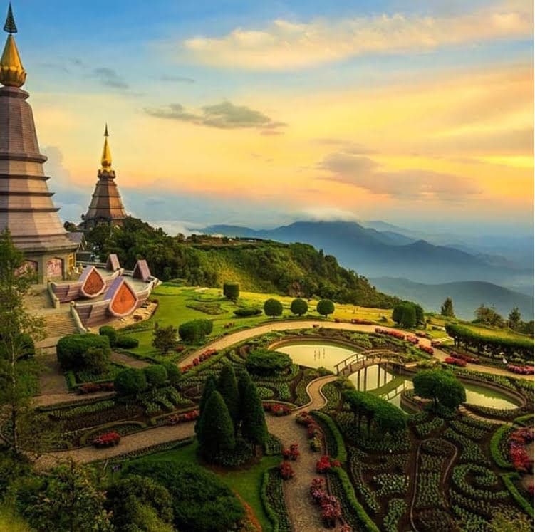 Iconic sunset view of the Twin Pagodas and lush gardens at Doi Inthanon.